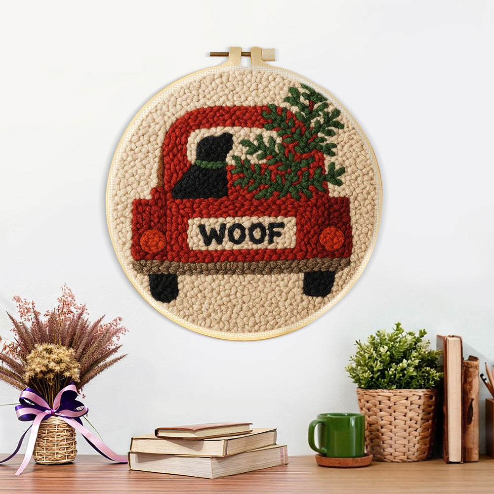 Finished "woof" red truck with dog artwork displayed on a wall