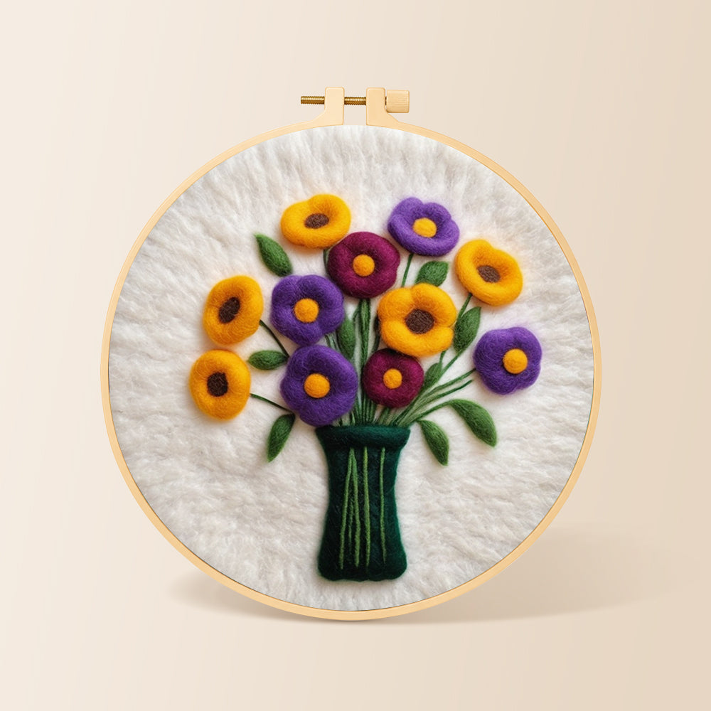 Yellow and purple flowers in vase needle felting kit for beginners with a round wooden frame