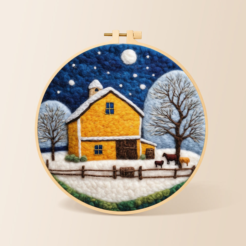 Yellow barn and white trees under the winter moon needle felting kit for beginners with a round wooden frame