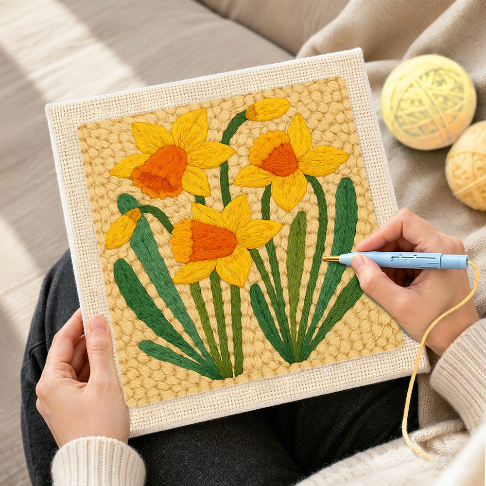 Creating handmade yellow daffodils punch needle artwork