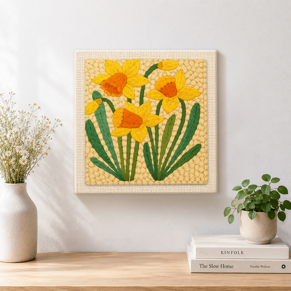 Finished yellow daffodils artwork displayed on a wall