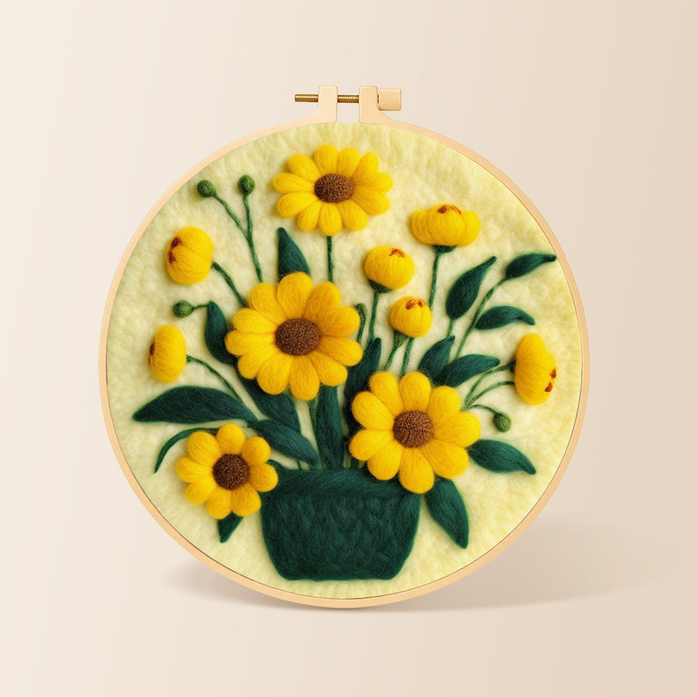 Yellow daisies in dark green vase needle felting kit for beginners with a round wooden frame