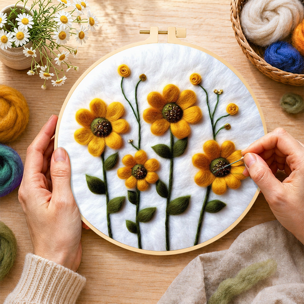 Creating the yellow daisies with green stamens wool painting by hand with a felting needle