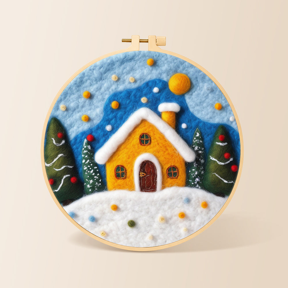 Yellow snowy cottage at christmas needle felting kit for beginners with a round wooden frame