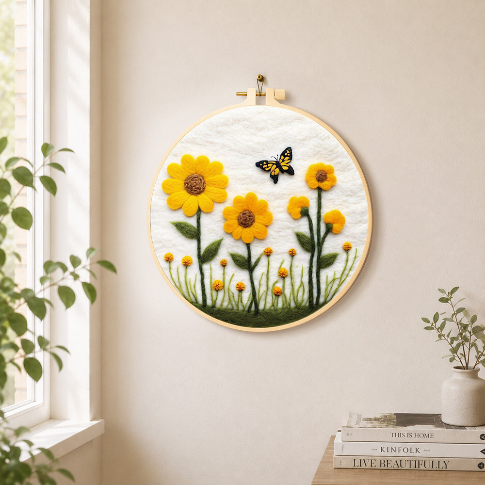Yellow sunflowers with butterfly needle felt wall art displayed in a bright home interior