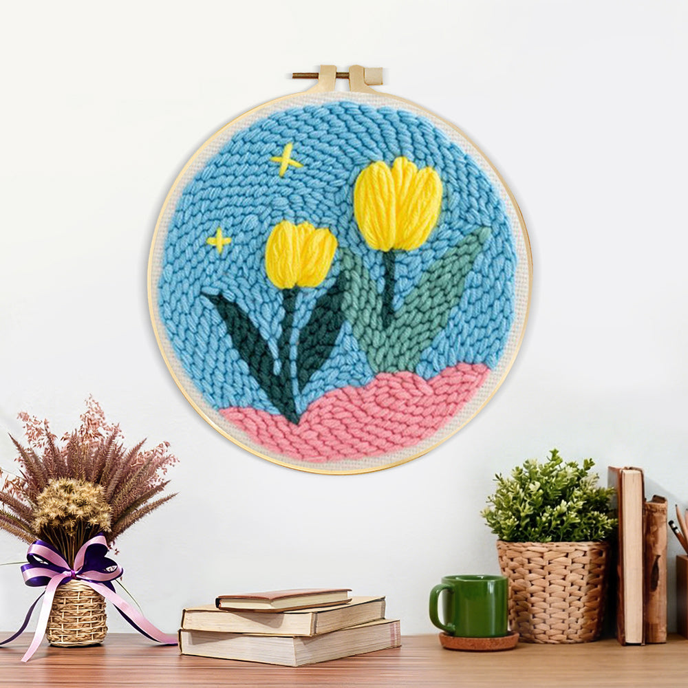 Finished yellow tulips on pink hills artwork displayed on a wall